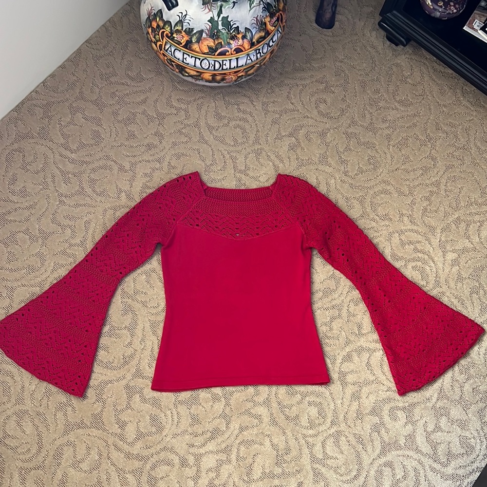 Venus red bell sleeve knit sweater. 58% cotton,38% acrylic, 4% polyester. Size M